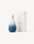 Blue bottle of Mwani Zanzibar’s Face & Body Skin Superfood, next to exterior packaging.