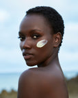 Mwani Zanzibar’s Face & Body Skin Superfood shown on skin.