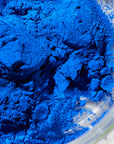 Close up of a bright blue powder.
